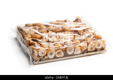 Pack  of Italian hazelnut brittle isolated on white Stock Photo