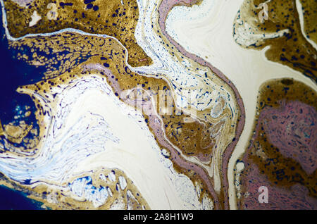 Blue and gold marbling pattern. Golden powder marble liquid texture Stock Photo