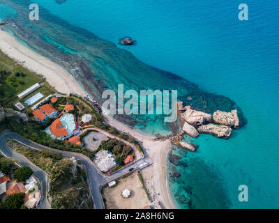 Aerial view of the Calabrian coast, villas and resorts on the cliff. Transparent sea and wild coast. Locality of Riaci near Tropea, Calabria. Italy Stock Photo