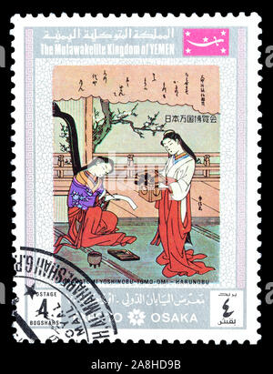 Cancelled postage stamp printed by The Mutawakkilite Kingdom of Yemen, that shows Painting by Harunobu, circa 1970. Stock Photo