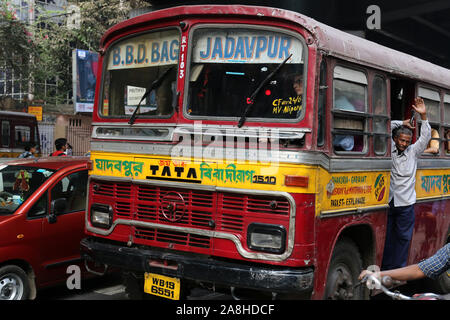 People on the move come in the colorful bus in Kolkata, India Stock Photo