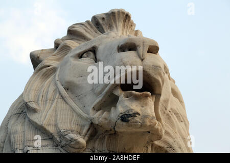 Antique Lion Statue in sky background at Victoria Memorial Gate, Kolkata, India Stock Photo