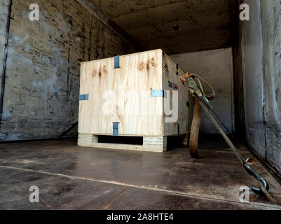 The radioactive material label beside the transportation wooden box Type A standard package in the truck Stock Photo