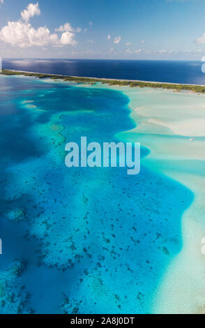 Sailing with catamaran in Tuamotu Archipelago french Polynesia - Aerial view of the lagoon by drone Stock Photo