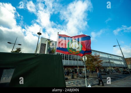 The flag of the Royal Engineers attached to an army vehicle at the 100 year Remembrance Day parade in Albion Square, Hanley Stock Photo