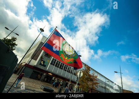 The flag of the Royal Engineers attached to an army vehicle at the 100 year Remembrance Day parade in Albion Square, Hanley Stock Photo