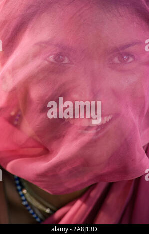 Beautiful Rajasthani woman wearing a traditional red sari Stock Photo ...