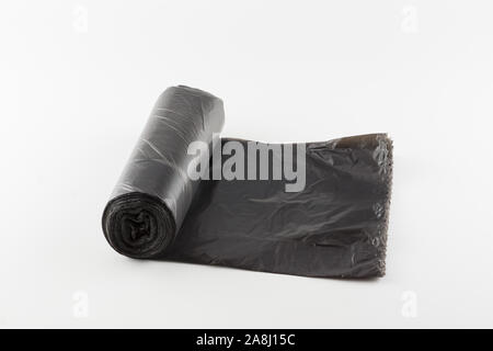 big roll of trash bags isolated on white background Stock Photo