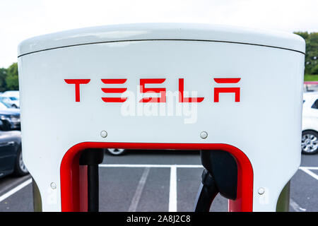 Tesla charging stations at the motorway services in the UK, Electric charging, electric vehicle charge points, service stations eco cars Stock Photo