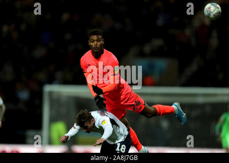 Preston North End's Ryan Ledson and Huddersfield Town's Steve Mounie during the Sky Bet Championship match at Deepdale, Preston. Stock Photo
