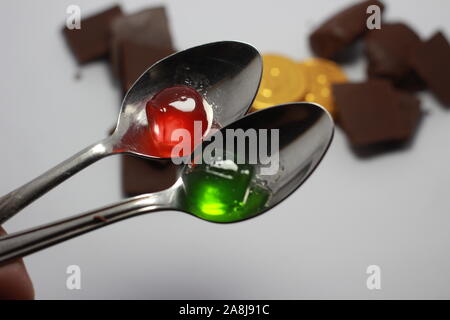 Kids favorite jelly chocolate over a spoon Stock Photo