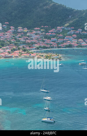 Terre-de-Haut Island in Guadeloupe, panorama of typical houses, the harbor in the bay with sailboats Stock Photo