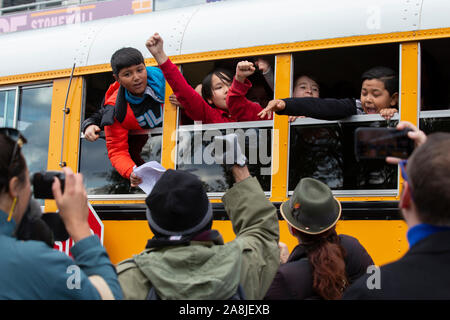 Washington, DC, USA. 8th Nov, 2019. Washington DC, USA. 9th November 8, 2019.Children look on as actress and political activist Jane Fonda, joined by Ben Cohen and Jerry Greenfield of Ben and Jerry‚Äôs Ice Cream, participates in a climate march from Capitol Hill to the White House in Washington, DC, U.S., on Friday, November 8, 2019. Activists marched to draw attention to the need to address climate change. Credit: Stefani Reynolds/CNP | usage worldwide Credit: dpa/Alamy Live News Stock Photo