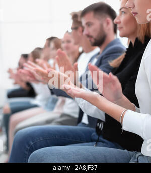 Applaud In Group Students applaud a colleague Stock Photo - Alamy