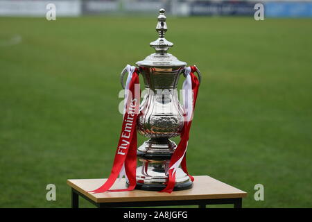Nantwich, Cheshire, UK. 9th November, 2019. The Football Association Cup (FA Cup) on display on the pitch at the Weaver Stadium ahead of the first round proper FA Cup fixture between Nantwich Town and AFC Fylde. Stock Photo