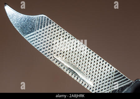 elements small foldable steel multitool, closeup, macro Stock Photo