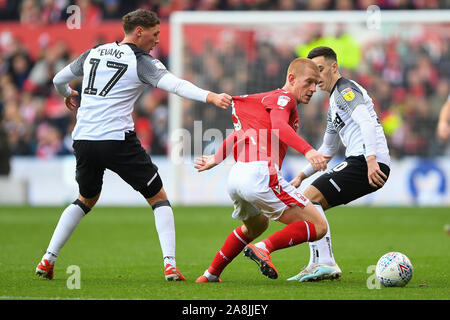 NOTTINGHAM, ENGLAND - NOVEMBER 9TH George Evans (17) of Derby County pulls the shirt of Ben Watson (8) of Nottingham Forest during the Sky Bet Championship match between Nottingham Forest and Derby County at the City Ground, Nottingham on Saturday 9th November 2019. (Credit: Jon Hobley | MI News) Photograph may only be used for newspaper and/or magazine editorial purposes, license required for commercial use Credit: MI News & Sport /Alamy Live News Stock Photo