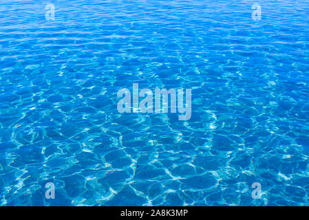 Pristine blue calm sea water surface with ripples Stock Photo