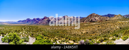Landscape view of White Rock Hills and Wilson Ridge mountains from Red Rock Canyon Overlook in Red Rock Canyon National Conservation Area in Nev, USA Stock Photo