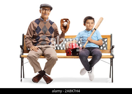 Boy and an elderly man sitting on a bench with a baseball equipment isolated on white background Stock Photo