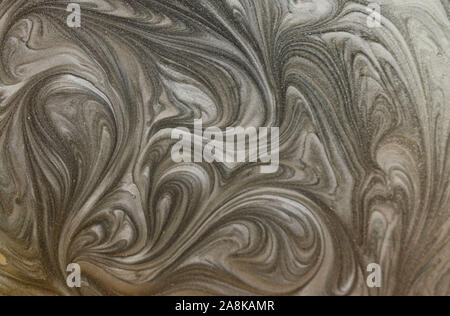Liquify Abstract Pattern With Brown And Black Graphics Color Art Form. Digital Background With Liquifying Flow Stock Photo