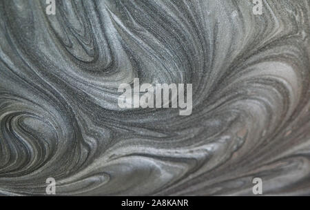 Liquify Abstract Pattern With Brown And Black Graphics Color Art Form. Digital Background With Liquifying Flow Stock Photo