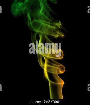 multicolored smoke on a black background Stock Photo
