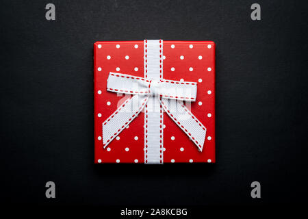 Flat lay red polka dots gift box Stock Photo