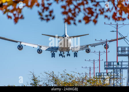 Passenger jet on approach for landing at Hartsfield-Jackson Atlanta International Airport in a beautiful autumn day in Atlanta, Georgia. (USA)