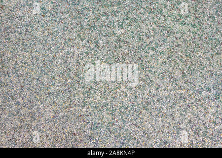 Green granite texture surface. Abstract smooth homogeneous grainy background. Stock Photo