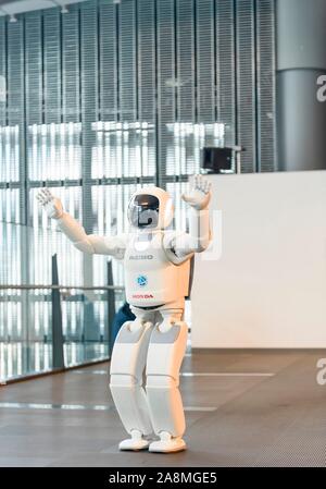 Human-like ASIMO, humanoid robot by Honda, National Museum of Emerging Science and Innovation, Miraikan, Tokyo, Japan Stock Photo