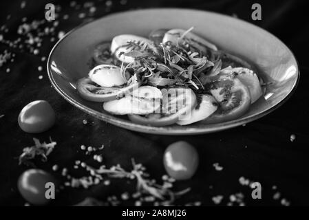 dliciouse italian dish - tasty caprese salad with fresh ingredients Stock Photo