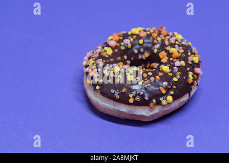 Macro shoot of donut on blue Stock Photo