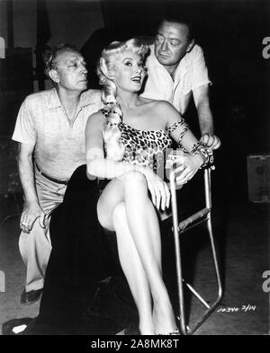 BUSTER KEATON on set candid with RHONDA FLEMING and PETER LORRE during filming of THE BUSTER KEATON STORY 1957 director Sidney Sheldon VistaVision Forum Productions / Paramount Pictures Stock Photo