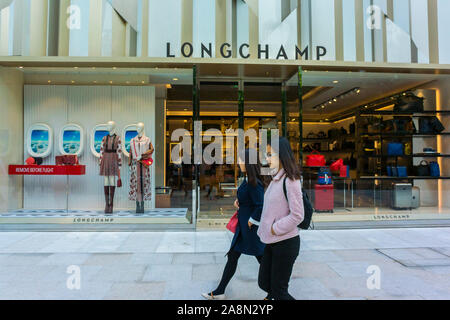 Shanghai, China, young women street scene, Luxury Shopping in Modern Commercial Center, shop window scene, china young woman walking, city shopping tourism fashion Stock Photo