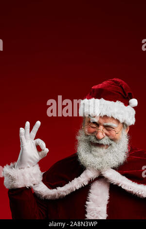 Portrait of Santa Claus winking Stock Photo - Alamy