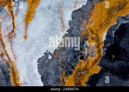 Onyx background with light blue, gray, white, black, brown, orange lines. Stock Photo
