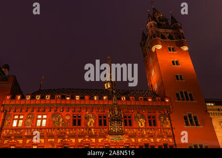 Basel city Rathaus or Town Hall facade at night. Scenic downtown cityscape, Marktplatz, Basel, Switzerland. Stock Photo