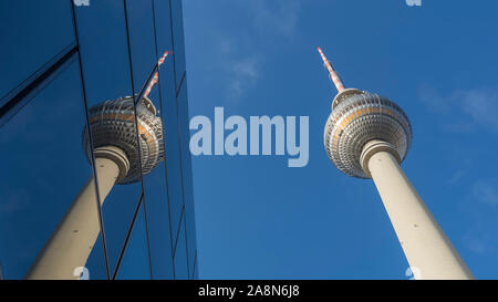 Beautiful urban reflections in the city center of Berlin, Germany, with a detail of the Tv Tower called Fernsehturm Stock Photo