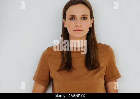 Close up portrait of a woman, no emotion, half length. Stock Photo