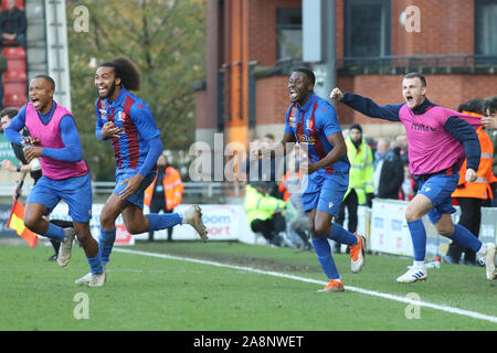 London, UK. 10th Nov, 2019. LONDON UNITED KINGDOM. NOVEMBER 10 The Maldon and Tiptree bench celebrate their win during The FA Cup First Round between Leyton Orient and Maldon and Tiptree at Brisbane Road, London, England on 10 November 2019 Credit: Action Foto Sport/Alamy Live News
