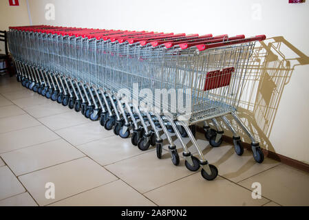 Carts lined up together. Lots of shopping carts. Stock Photo