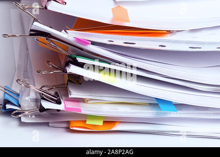 Pile of unfinished documents in office, stack of business reports, paper work Stock Photo