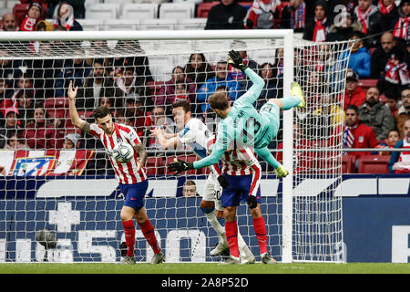 10th November 2019; Wanda Metropolitano Stadium, Madrid, Spain; La Liga Football, Atletico de Madrid versus Espanyol; Jan Oblak (Atletico de Madrid) comes out to collect the cross but falls awkwardly and drops the ball - Editorial Use Stock Photo