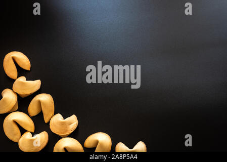 Fortune cookies on black background. Stock Photo