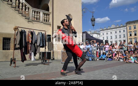 Performance titled MANTO by duo named Les Malles , Street Theatre Festival Oh, What a Circus, Krakow, Poland, July 4 2019 Stock Photo