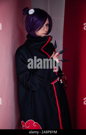 woman anime cosplayer with purple japan hair Stock Photo - Alamy