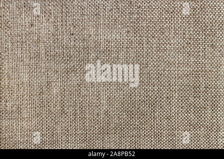 The structure of the coarse linen cloth as background Stock Photo