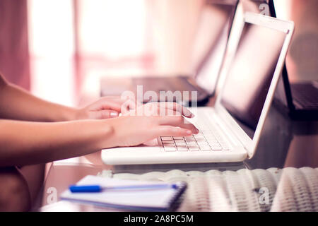 Woman works with laptop. People, internet and technology concept Stock Photo