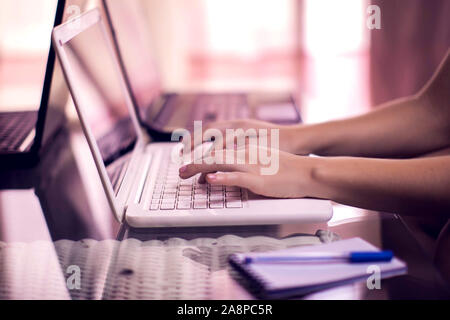 Woman works with laptop. People, internet and technology concept Stock Photo